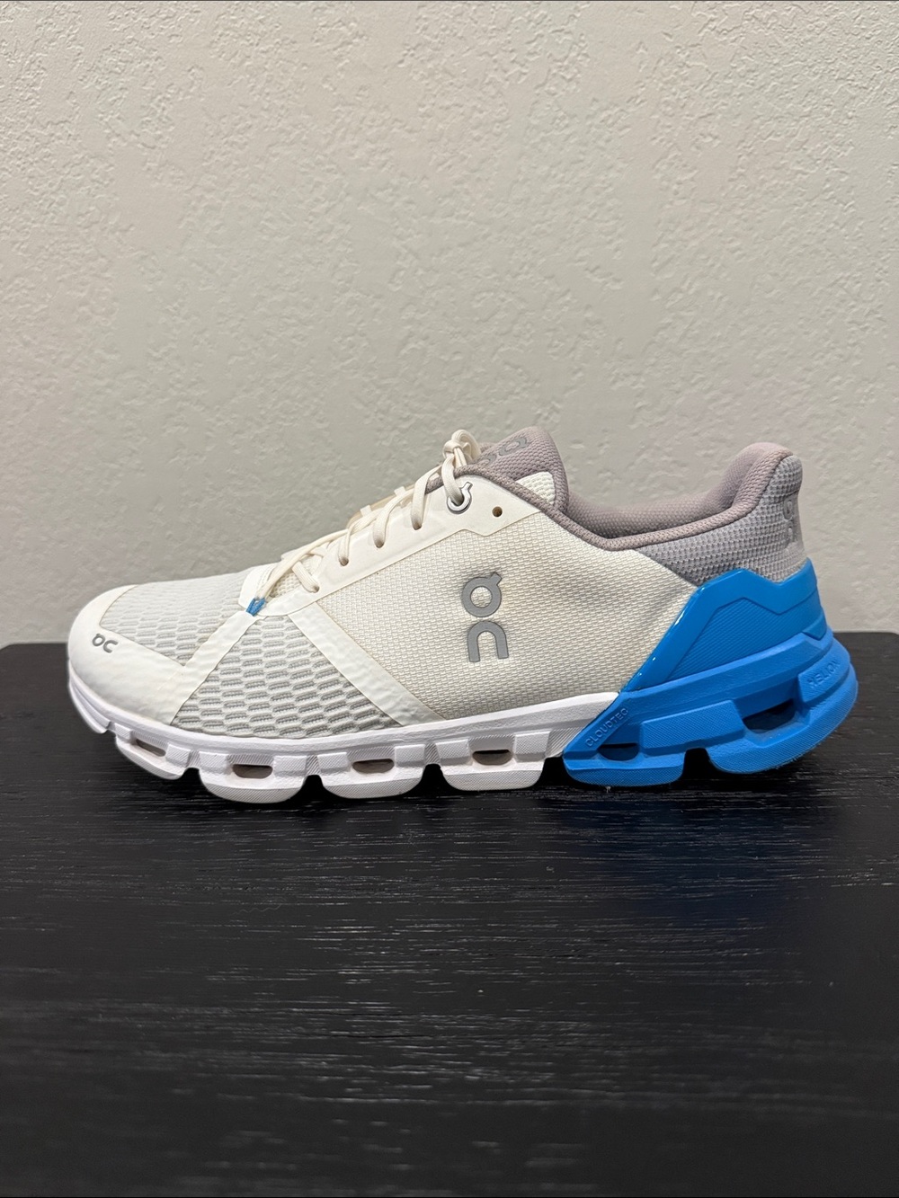 On Running Men's Athletic Shoe White with Blue Accents